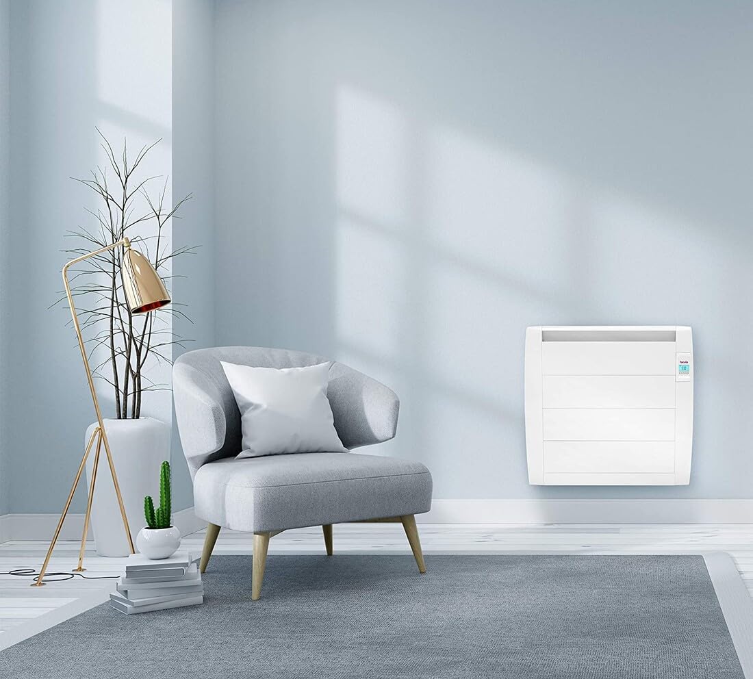 Emisor térmico 900W sin fluido, eficiente, seguro y compacto, ideal para calentar espacios reducidos y mantener una temperatura agradable.