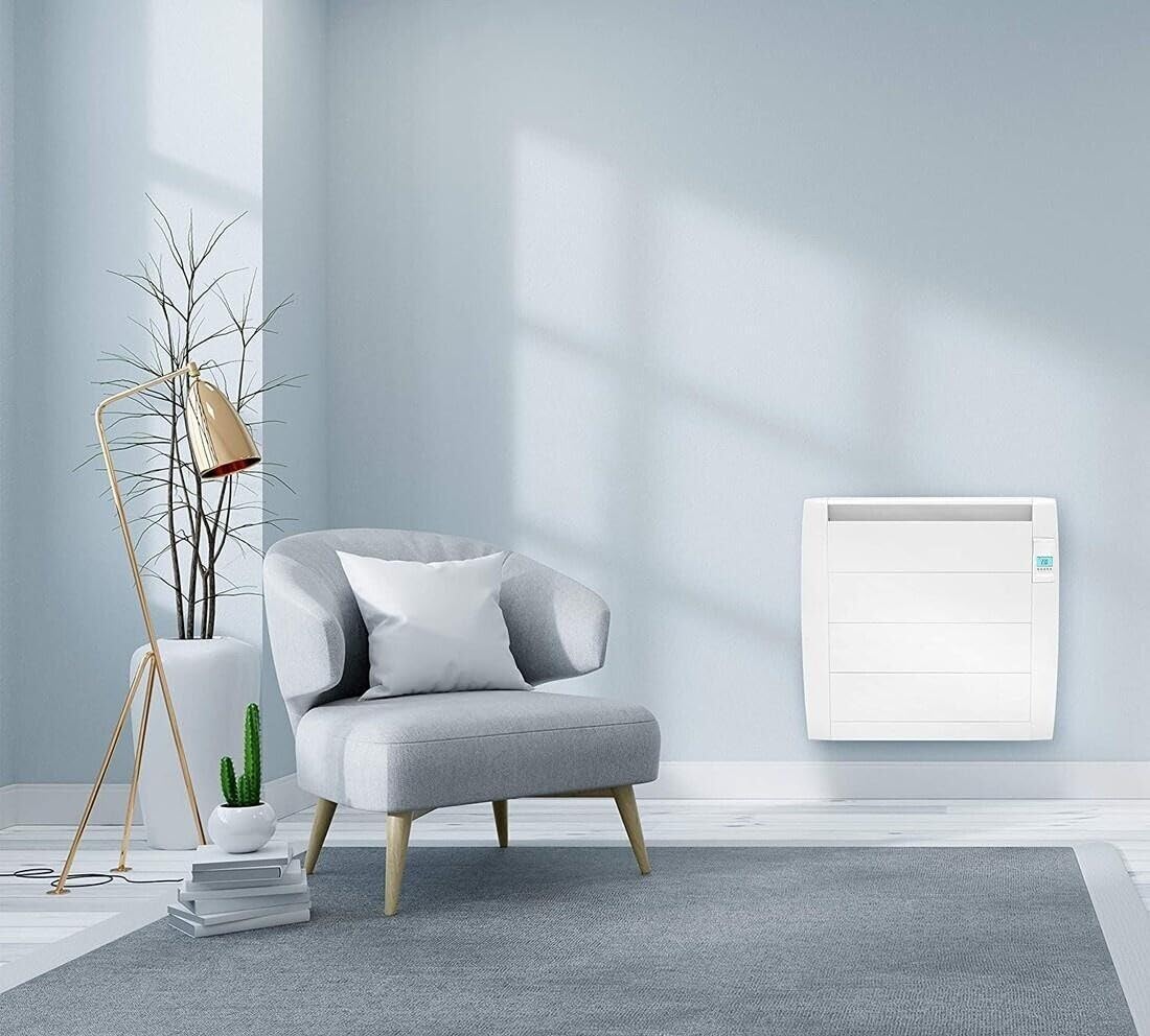 Emisor térmico 900W sin fluido, eficiente, seguro y compacto, ideal para calentar espacios reducidos y mantener una temperatura agradable.