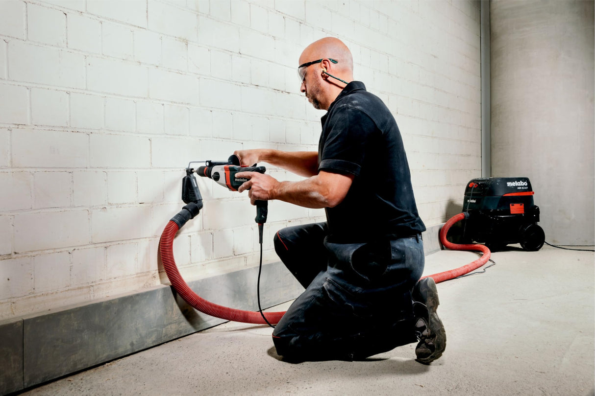 metabo Taladro percutor SBEV 1300-2 S – 1300 W, 2 velocidades, 44 Nm – Vario-velocímetro Constamatic, carcasa de aluminio, motor maratón, acoplamiento de seguridad, para hormigón, acero, madera