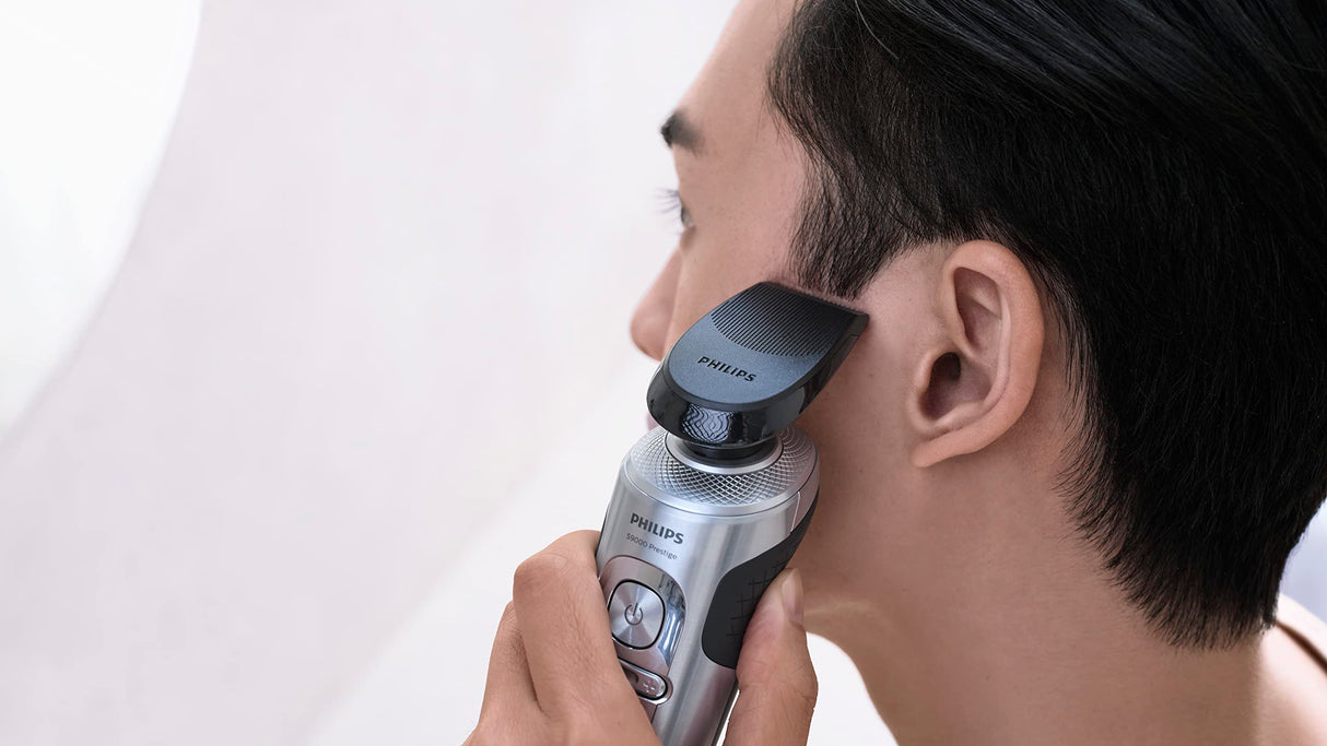 Philips Serie 9000 Prestige Afeitadora Eléctrica Hombre, Máquina de Afeitar Barba con Barbero, 72 cuchillas, 60min de uso, En Seco y Húmedo, Recargable, Base Carga QI, Naricero, SP9871/22, Cromo