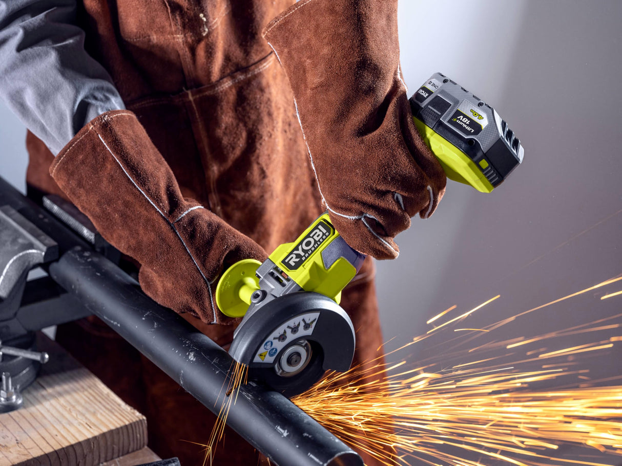 RYOBI - Amoladora angular de 2000 W diam. 230 mm - 6600 rpm - Mango trasero orientable 180° - Soft Start - Viene con 1 disco para desbarbar metal diam. 230 mm y 1 llave de servicio - EAG2000-G