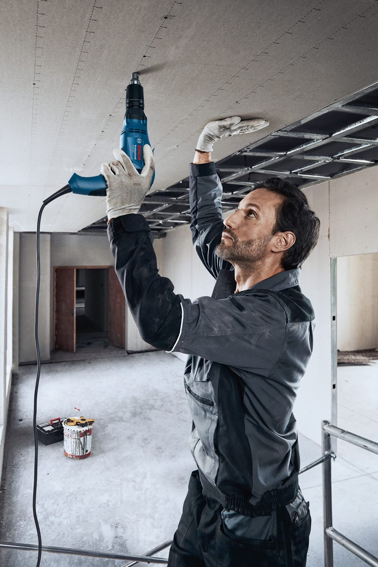 Bosch Professional GTB 6-50 - Atornillador para placa de yeso (0-5000 rpm, 650 W, Ø máx. tornillo 6 mm, tope retráctil, en maletín)