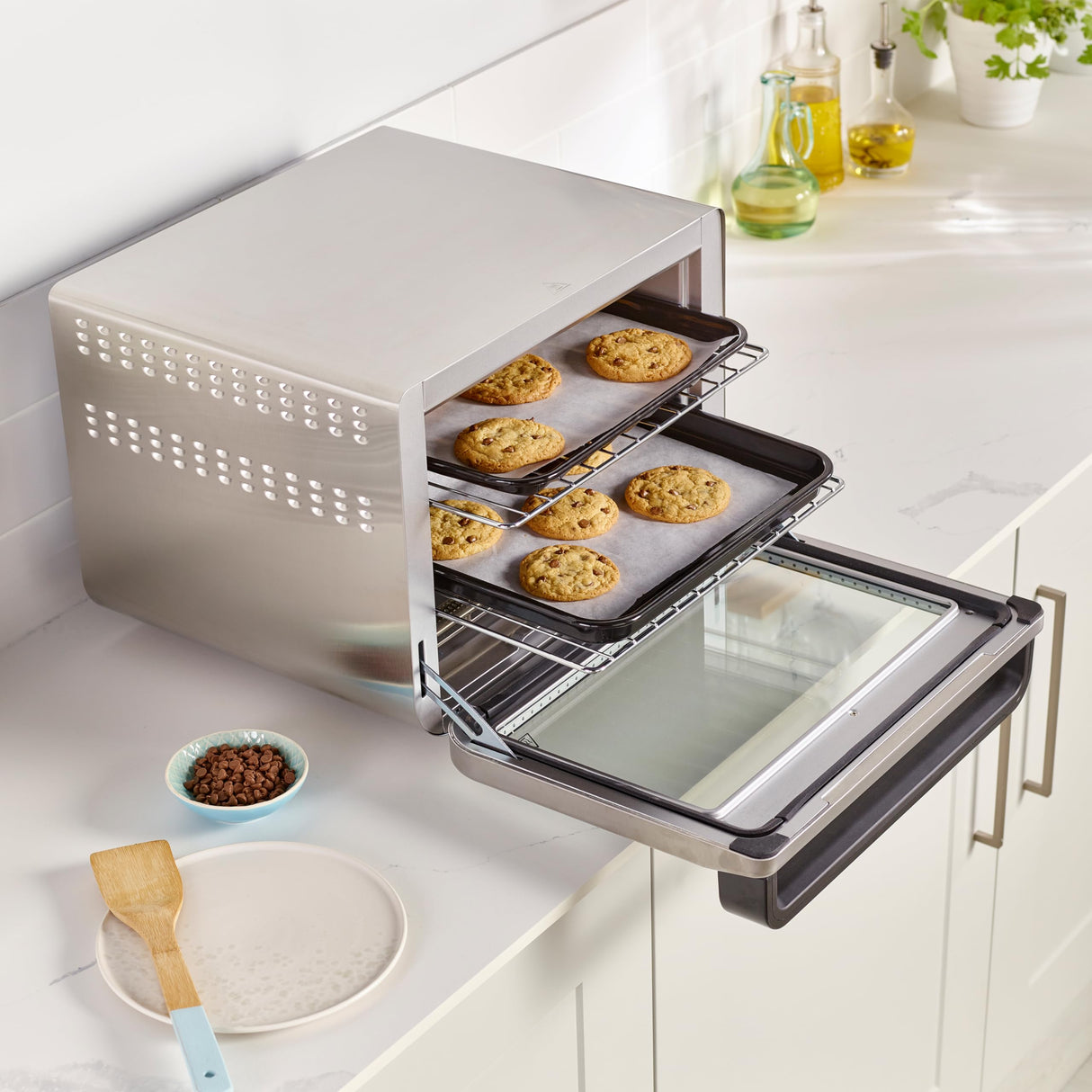 Ninja Foodi Horno multifunción 10 en 1, Mini horno portátil para encimeras y superficies de trabajo, 10 funciones de cocción, Freír con aire, Asar, Parrilla, Hornear y más, en plata y negro, DT200EU