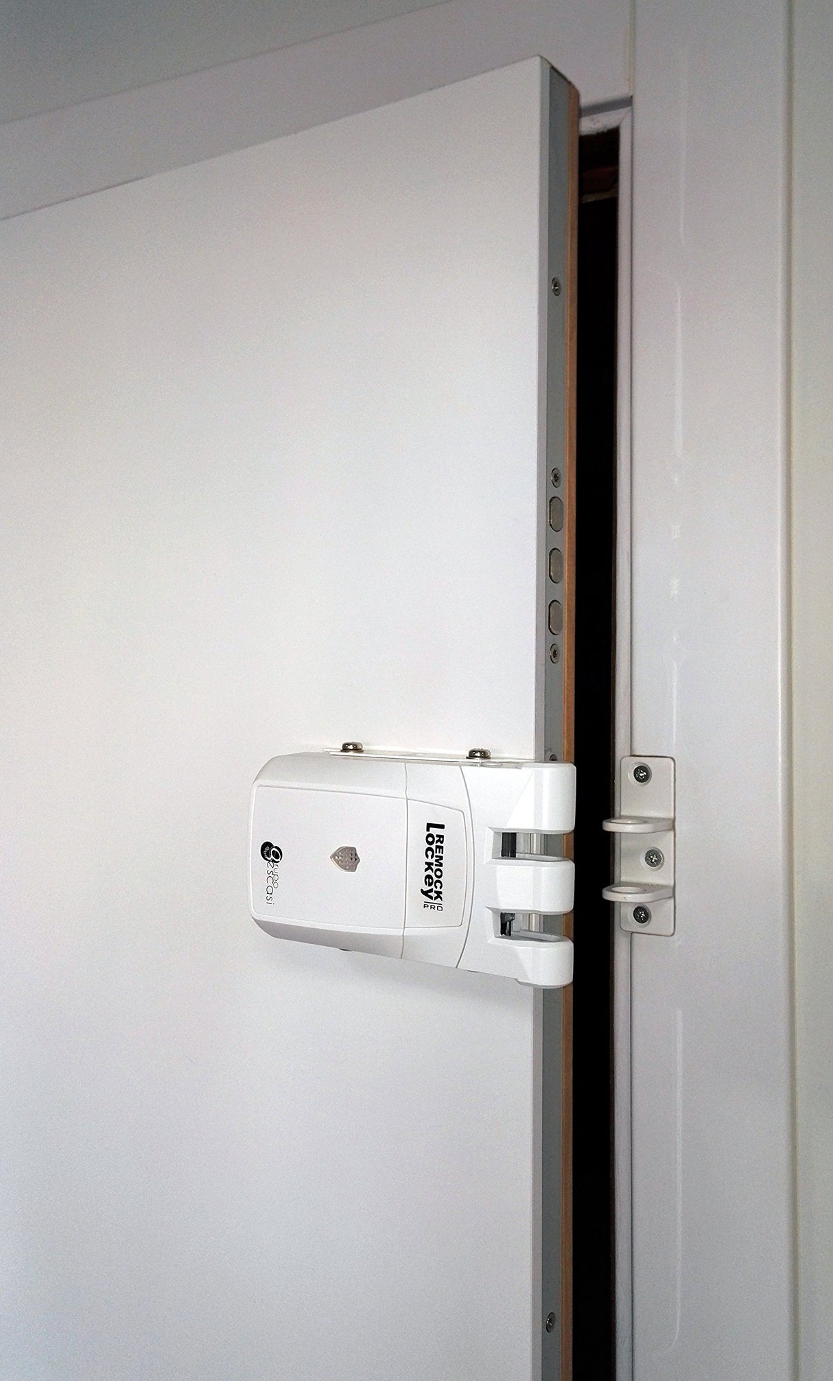 Remock RLP4W Lockey Pro - Cerradura de seguridad invisible con 4 mandos (3 V) color blanco