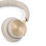 Bang & Olufsen Beoplay HX Auriculares Premium Inalámbricos Bluetooth de Diadema con Cancelación de Ruido, 6 Micrófonos, hasta 40 Horas de Autonomía, Cascos y Estuche Gold Tone