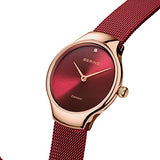 BERING 13326-Charity Reloj de cuarzo para mujer con caja de acero inoxidable de 26 mm con acabado en oro rosa y esfera roja, correa milanesa, cristal de zafiro y resistencia al agua de 3 ATM