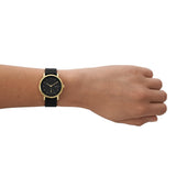 Skagen Kuppel reloj para mujer, movimiento de cuarzo con correa de acero o piel, Negro y tono dorado, 32MM