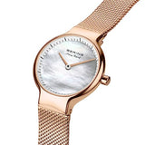 BERING 15527-364 Reloj de Cuarzo para Mujer con Caja de Acero Inoxidable de 27 mm con Acabado en Oro Rosa y Esfera Blanca, Correa milanesa, Cristal de Zafiro y Resistencia al Agua de 5 ATM