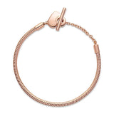 Pandora Moments Pulsera con cadena de serpiente chapada en oro rosa de 14 quilates con cierre en forma de corazón y barra en T, 21