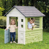 Smoby Life Casa de Juegos Jolie - Resistente a los Rayos UV - Plástico Reciclado 59% - Ideal para Jardín o Terraza - con Puerta Baja y Ventanas con Listones - A Partir de 2 Años (7600810737)