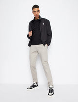 Armani Exchange Packable, Hidden Hoodie, Two Zip Pockets on Front, Rubber Patch Logo Chaqueta cortavientos para Hombre, Negro, XXL