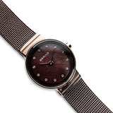 BERING 10122-265 Reloj de cuarzo para mujer con caja de acero inoxidable de 22 mm con acabado en oro rosa y esfera marrón, correa milanesa, cristal de zafiro y resistencia al agua de 3 ATM