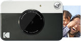 KODAK: Paquete cámara instantánea Printomatic (Negro) + Papel Zink (20 Hojas) + Funda álbum de Fotos + Marcos para Colgar + cómoda