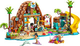 LEGO Friends Hotel de Vacaciones Familiares en la Playa - Juguete con 6 Mini Muñecas, Figuras de Animales (Tortuga y Delfín), Heladería y Accesorios - Regalo para Niñas de 8+ Años 42673