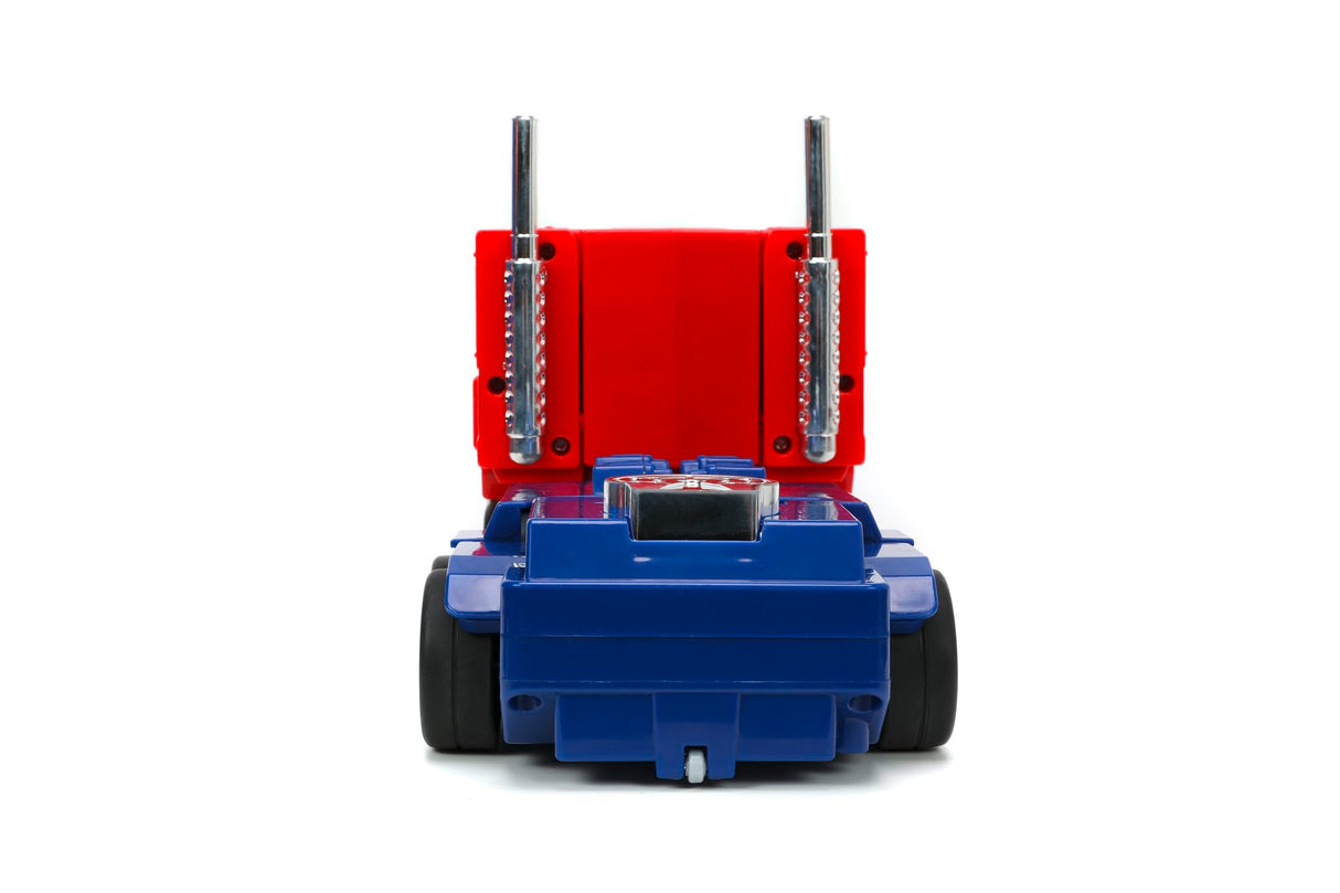 Jada Transformers Converting RC Optimus Prime - Coche de Control Remoto Modelo G1 Original - 30 cm de Largo en Modo camión, pie 35 cm de Alto Convertido en Modo Autobot con Luces Sonidos y Voz