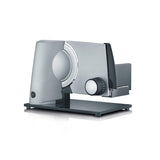 GRAEF Cortafiambres multiusos SKS320 plata, carcasa metálica, cuchilla dentada Ø170 mm de acero inoxidable, diseño compacto, base de cristal, función continua, seguridad infantil, fácil limpieza