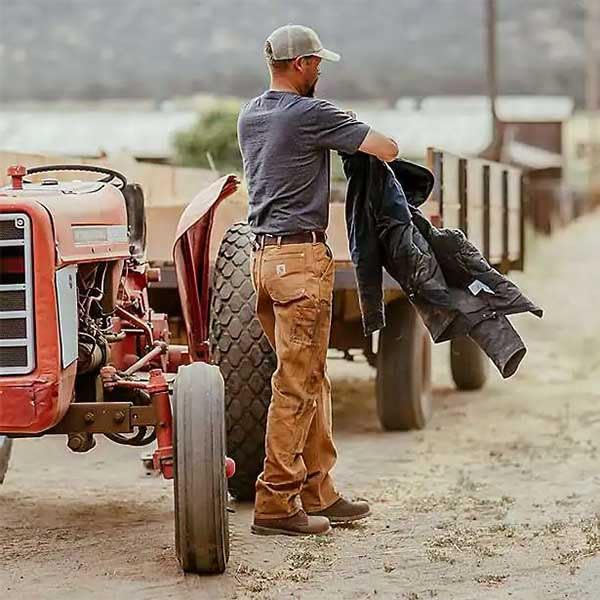 Carhartt Pantalón de trabajo utilitario en lona de algodón resistente con parte frontal doble, Loose Fit Para Hombre, Carhartt Brown, W36/L32