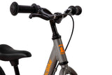 FabricBike Mini 12" - Bicicleta sin Pedales para niños, 18 Meses - 3 años. Bici Ultraligera de Aprendizaje con Manillar y Sillín Ajustables. (Mini Pro Graphite & Orange)