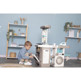 Smoby- Cocina de Juguete Cleaning, 2-en-1, con Funciones de Cocina y Limpieza, con Lavadora, Tendedero, Plancha, Adecuado a Partir de 3 Años (7600311050)