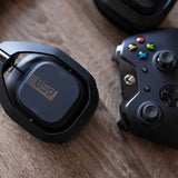 ASTRO Gaming A50 Auriculares inalámbricos para gaming y estación-base de carga, 4a gen, control de balance de juego, voz, 2.4 GHz, 15m alcance, Xbox Series X y S, Xbox One, PC - Negro/Oro