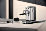 WMF Lono - Cafetera expreso con 2 portafiltros, 1350 W, para 1-2 tazas de espresso, 15 bares, reposavasos, espumador de leche, cuchara prensadora de café, acero inoxidable mate