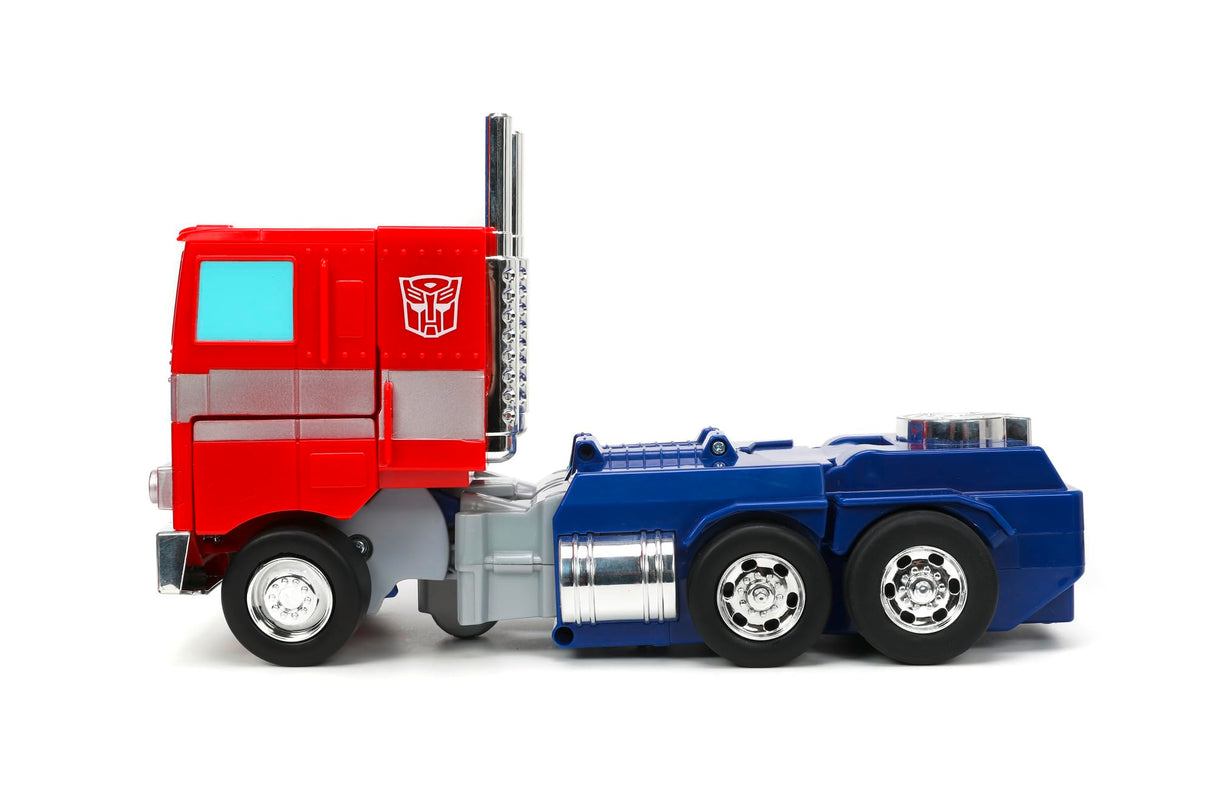 Jada Transformers Converting RC Optimus Prime - Coche de Control Remoto Modelo G1 Original - 30 cm de Largo en Modo camión, pie 35 cm de Alto Convertido en Modo Autobot con Luces Sonidos y Voz