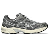 Asics GEL-1130, Sneaker Hombre, Gris Arcilla y Plateado, 41.5 EU