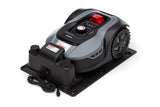 IKRA Robot cortacésped iROM 600 para céspedes de hasta 600 m², WiFi o Bluetooth, Control por App, multizona, Incl. estación de Carga & Sensor de Lluvia, 6 Cuchillas de Repuesto