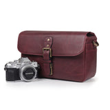 MegaGear Torres Mini Bolsa de mensajería de la cámara de Cuero Genuina para cámaras sin Espejo, instantáneas y DSLR - Maroon - Granate