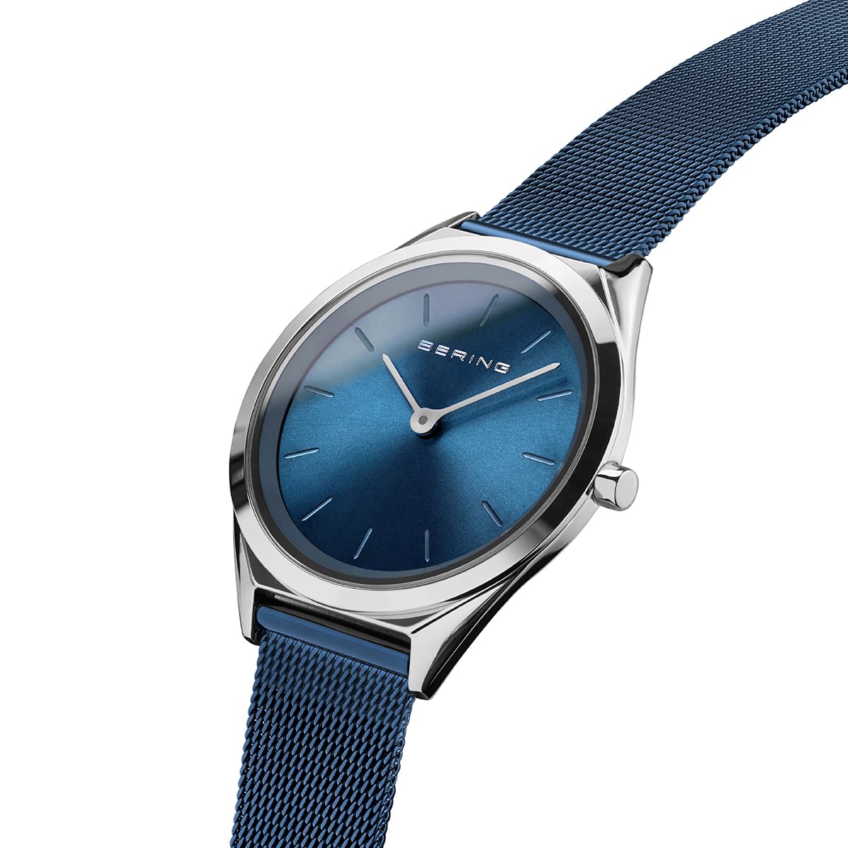 BERING 17031-307 Reloj de cuarzo unisex con caja de acero inoxidable plateado de 31 mm y esfera azul, correa milanesa, cristal de zafiro y resistencia al agua de 3 ATM
