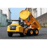 Carrera - 37025004-1:24 RC Cat 745 Articulated Truck - Camión articulado