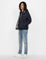 Armani Exchange Chaqueta Acolchada con Capucha y Cremallera, Logotipo de Milano/New York, Azul Marino/Gris Jaspeado, L para Hombre