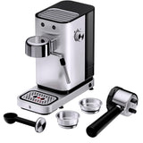 WMF Lono - Cafetera expreso con 2 portafiltros, 1350 W, para 1-2 tazas de espresso, 15 bares, reposavasos, espumador de leche, cuchara prensadora de café, acero inoxidable mate