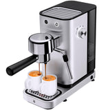 WMF Lono - Cafetera expreso con 2 portafiltros, 1350 W, para 1-2 tazas de espresso, 15 bares, reposavasos, espumador de leche, cuchara prensadora de café, acero inoxidable mate