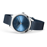 BERING 17031-307 Reloj de cuarzo unisex con caja de acero inoxidable plateado de 31 mm y esfera azul, correa milanesa, cristal de zafiro y resistencia al agua de 3 ATM