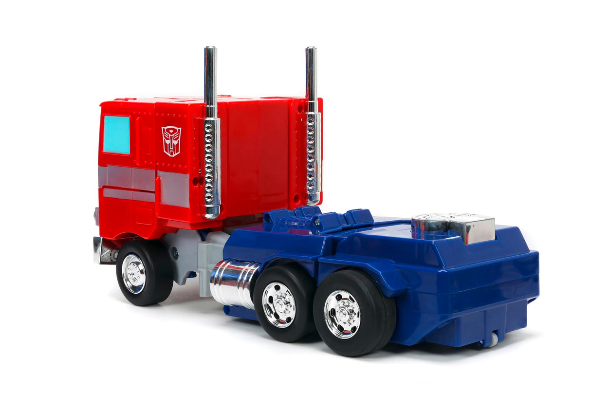 Jada Transformers Converting RC Optimus Prime - Coche de Control Remoto Modelo G1 Original - 30 cm de Largo en Modo camión, pie 35 cm de Alto Convertido en Modo Autobot con Luces Sonidos y Voz