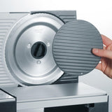 GRAEF Cortafiambres multiusos SKS320 plata, carcasa metálica, cuchilla dentada Ø170 mm de acero inoxidable, diseño compacto, base de cristal, función continua, seguridad infantil, fácil limpieza