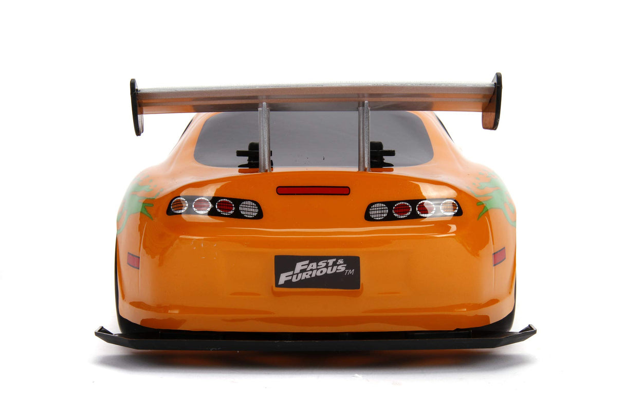Jada Toys 253209003 Toys Fast & Furious RC Auto, Drift 1995 Toyota Supra, Turbo, función de Deriva, tracción en Las Cuatro Ruedas, Coche teledirigido, Mando a Distancia de 2 Canales, función de Carga
