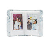 instax Mini 12 Kit con cámara. El Kit Contiene cámara, Funda, Mini álbum, Carga de 10 Fotos y Pegatinas.