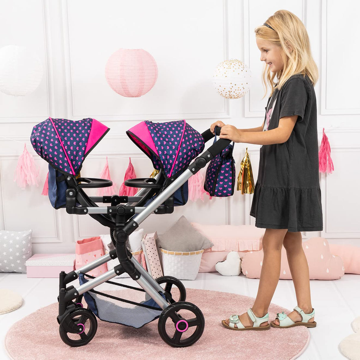 Bayer Design 26254AA Cochecito de Muñeca Gemelas, Carrito Paseo para muñecos, Ajustable en Altura, Plegable, con la Bolsa de Bandoler, Azul con Unicornio y Corazones