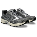 Asics GEL-1130, Sneaker Hombre, Gris Arcilla y Plateado, 41.5 EU