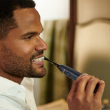 Philips Sonicare DiamondClean Prestige 9900: cepillo dental eléctrico sónico con un cabezal de cepillado Premium All-in-One A3 y estuche de carga en color azul noche modelo HX9992/12