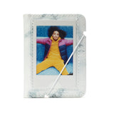 instax Mini 12 Kit con cámara. El Kit Contiene cámara, Funda, Mini álbum, Carga de 10 Fotos y Pegatinas.