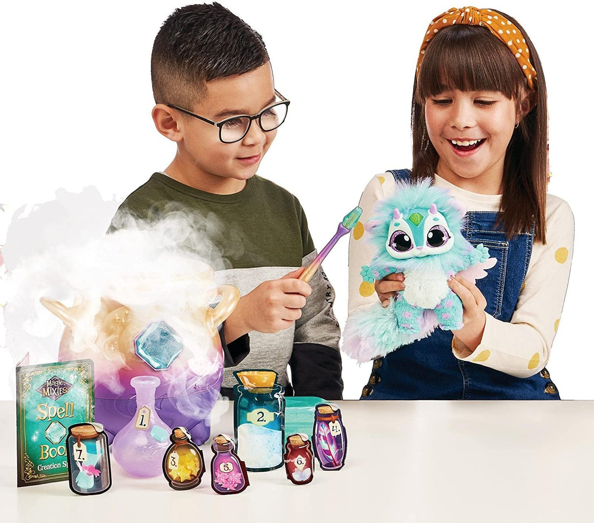 Magic Mixies Peluche Color Azul, Juguete Interactivo de Magia, con caldero de pócimas, Luces Efectos y Sonidos, muñeco con Muchos Accesorios como una Varita, (MGX01000)