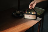 Sangean RA-101 Black Gold. Diseño Retro de Madera y Piel sintética. Bluetooth 5.0. Autonomía 19 Horas con una Carga Completa. AUX-in para Fuentes de Audio externas.