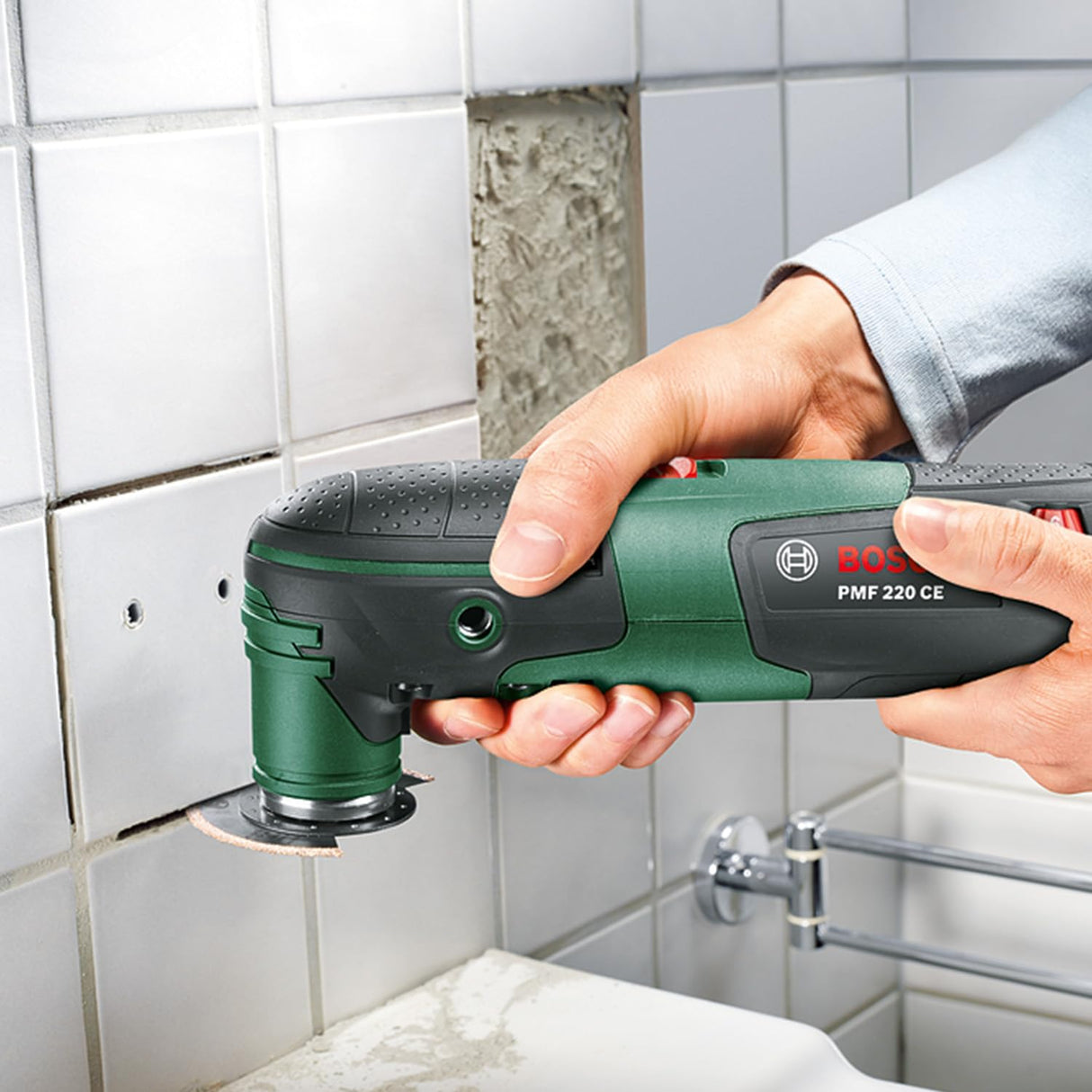 Bosch Multiherramienta PMF 220 CE Set,3 hojas de sierra, placa lijadora, set de hojas de lija, rascadora flexible, cuchilla, tope de profundidad, sistema de aspiración, maletín (220W)