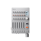 Teenage Engineering TX–6 Mezclador portátil con 6 canales estéreo e interfaz de audio USB con batería recargable de 8 horas, midi BLE y USB, compatible con iOS