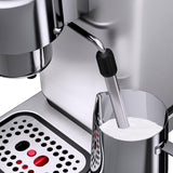 WMF Lono - Cafetera expreso con 2 portafiltros, 1350 W, para 1-2 tazas de espresso, 15 bares, reposavasos, espumador de leche, cuchara prensadora de café, acero inoxidable mate