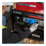XGREENS Generador de corriente (gasolina) X70MTE (máx. 6.000W, depósito 40 l, AVR, Powered by Honda, eléctrico, ruedas, alerta aceite, trifásico, 3 tomas 230/400V, protección térmica y panel digital)