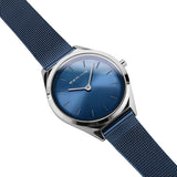 BERING 17031-307 Reloj de cuarzo unisex con caja de acero inoxidable plateado de 31 mm y esfera azul, correa milanesa, cristal de zafiro y resistencia al agua de 3 ATM
